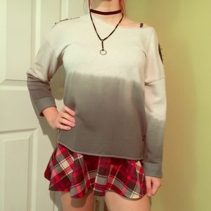 Dip dye grey sweater with spiked shoulders.